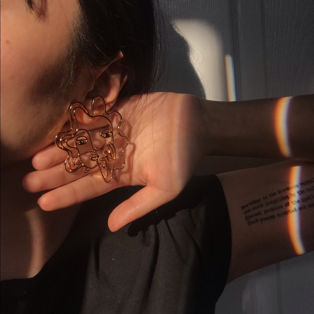 Female portrait earring